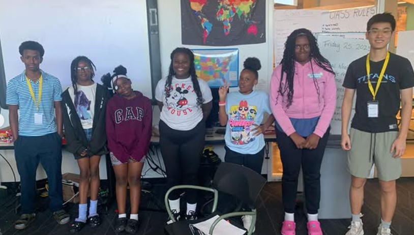 Students and FutureReadyTeens volunteers after a workshop